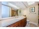 Updated bathroom with a large vanity and shower at 36750 Us Highway 19 # 21-301, Palm Harbor, FL 34684