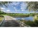 Wooden footbridge over water feature on the golf course at 36750 Us Highway 19 # 21-301, Palm Harbor, FL 34684