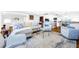 Spacious living area featuring a neutral color palette and ample natural light at 36750 Us Highway 19 # 21-301, Palm Harbor, FL 34684