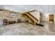 Lobby with wood staircase, brick walls, and comfortable seating at 36750 Us Highway 19 # 21-301, Palm Harbor, FL 34684