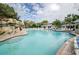 Expansive pool with a rock waterfall feature at 36750 Us Highway 19 # 21-301, Palm Harbor, FL 34684