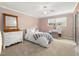 Bright bedroom with carpeted floor and ceiling fan at 3817 W Platt St # 306, Tampa, FL 33609