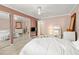 Bedroom with mirrored closet doors and ceiling fan at 3817 W Platt St # 306, Tampa, FL 33609