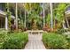Lush courtyard with fountain and walking path at 3817 W Platt St # 306, Tampa, FL 33609