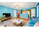 Open living room and kitchen with a stylish design at 3817 W Platt St # 306, Tampa, FL 33609