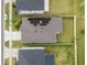 Aerial view showing home with solar panels and fenced backyard at 3946 Postmark Lake Pl, Seffner, FL 33584