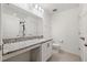 Bathroom with granite countertop, single vanity, and shower at 3946 Postmark Lake Pl, Seffner, FL 33584