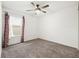 Charming bedroom with window and carpeted floor at 3946 Postmark Lake Pl, Seffner, FL 33584