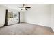 Spacious bedroom with carpeted floors and ceiling fan at 3946 Postmark Lake Pl, Seffner, FL 33584