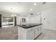 Open concept kitchen with island and granite countertops at 3946 Postmark Lake Pl, Seffner, FL 33584