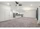 Open concept kitchen with stainless steel appliances and island at 3946 Postmark Lake Pl, Seffner, FL 33584