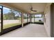 Spacious screened porch overlooking backyard at 3946 Postmark Lake Pl, Seffner, FL 33584