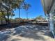 Backyard with patio, wooden fence, and a view of a pool at 4039 Eastridge Dr, Valrico, FL 33596