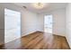 Bright dining room with wood-look floors, open to kitchen at 4039 Eastridge Dr, Valrico, FL 33596