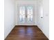 Bright entryway with double doors and wood-look flooring at 4039 Eastridge Dr, Valrico, FL 33596