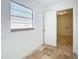 Laundry room with tile floor and window at 4039 Eastridge Dr, Valrico, FL 33596