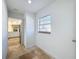 Bright laundry room with tile floor and access to backyard at 4039 Eastridge Dr, Valrico, FL 33596