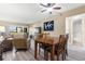 Dining area with wood table and chairs, near living room at 6219 Palma Del Mar S Blvd # 114, St Petersburg, FL 33715