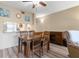 Dining area with wooden table and chairs, adjacent to kitchen at 6219 Palma Del Mar S Blvd # 114, St Petersburg, FL 33715