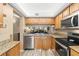 Updated kitchen with stainless steel appliances and granite countertops at 6219 Palma Del Mar S Blvd # 114, St Petersburg, FL 33715