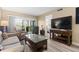 Living room with access to balcony and comfortable furniture at 6219 Palma Del Mar S Blvd # 114, St Petersburg, FL 33715