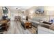Open concept living room and dining area with hardwood floors at 6219 Palma Del Mar S Blvd # 114, St Petersburg, FL 33715