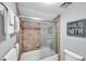 Updated bathroom with tub/shower combo and tile flooring at 6311 Newtown Cir # 11B1, Tampa, FL 33615