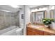 Bathroom with granite countertop and updated vanity at 6311 Newtown Cir # 11B1, Tampa, FL 33615