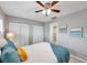 Spacious bedroom with ceiling fan and built-in closet at 6311 Newtown Cir # 11B1, Tampa, FL 33615