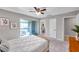 Primary bedroom with private balcony and en-suite bathroom at 6311 Newtown Cir # 11B1, Tampa, FL 33615