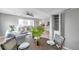 Dining area with round table and view into the kitchen at 6311 Newtown Cir # 11B1, Tampa, FL 33615