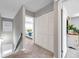 Upstairs hallway with access to bedrooms and ample closet space at 6311 Newtown Cir # 11B1, Tampa, FL 33615