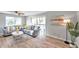 Living room features neutral decor and wood-look floors at 6311 Newtown Cir # 11B1, Tampa, FL 33615