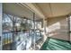 Relaxing screened balcony overlooking a serene canal at 6311 Newtown Cir # 11B1, Tampa, FL 33615