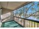 Spacious screened balcony boasting scenic water views at 6311 Newtown Cir # 11B1, Tampa, FL 33615