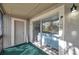 Spacious screened patio with sliding glass doors and exterior storage at 6311 Newtown Cir # 11B1, Tampa, FL 33615