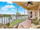 Spacious screened-in balcony overlooking a peaceful waterfront view at 6363 99Th N Way # 12A, St Petersburg, FL 33708