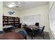 Community room with tables, chairs, and a book shelf at 6363 99Th N Way # 12A, St Petersburg, FL 33708