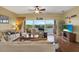 Bright living room with water views and hardwood floors at 6363 99Th N Way # 12A, St Petersburg, FL 33708