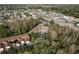 Aerial view of townhomes and community amenities, including a pool at 8907 Casablanca Way, Tampa, FL 33626