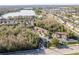 Aerial view of townhouses near a lake at 8907 Casablanca Way, Tampa, FL 33626