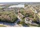 Aerial view of townhouses near a lake at 8907 Casablanca Way, Tampa, FL 33626