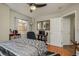 Bright bedroom with a comfortable bed and built-in shelves at 8907 Casablanca Way, Tampa, FL 33626