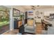 Dining area with a table, chairs, and view of the backyard at 8907 Casablanca Way, Tampa, FL 33626