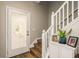 Interior entryway with stairs and decorative plants at 8907 Casablanca Way, Tampa, FL 33626