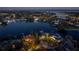 Night view of waterfront home and community at 930 Monterey Ne Pt, St Petersburg, FL 33704