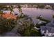 Aerial view of waterfront home with pool and private dock at 930 Monterey Ne Pt, St Petersburg, FL 33704