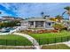 House with pool, landscaping, and patio at 930 Monterey Ne Pt, St Petersburg, FL 33704