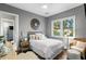 Bright bedroom featuring a queen bed and calming decor at 930 Monterey Ne Pt, St Petersburg, FL 33704