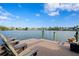 Relaxing waterfront dock with seating at 930 Monterey Ne Pt, St Petersburg, FL 33704